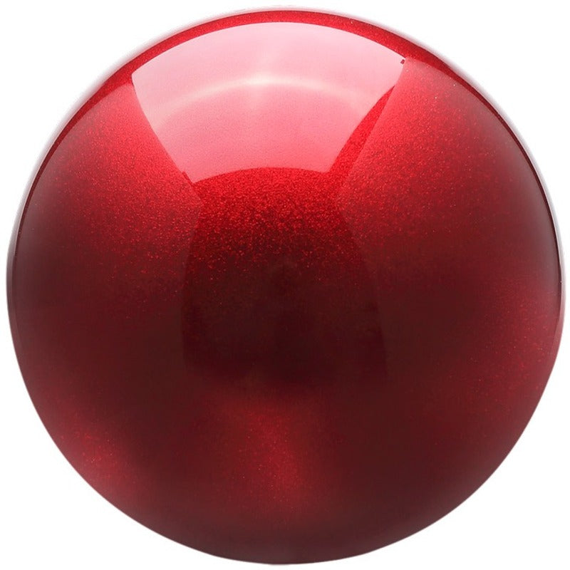 Detailed close-up of the red trackball showing surface texture and finish