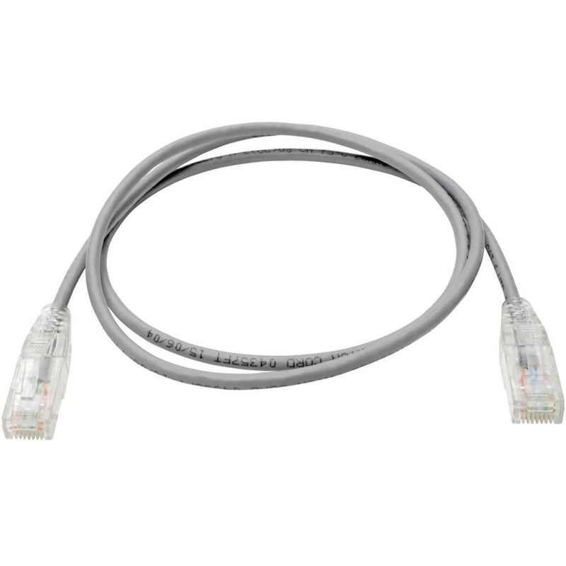 Full view of slim gray Cat6 patch cable with RJ45 connectors coiled in natural position