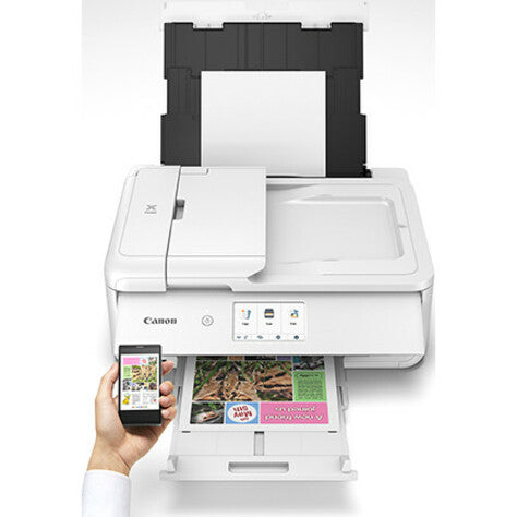 Canon PIXMA TS9521C demonstrating mobile printing capability with smartphone-alternate-image8