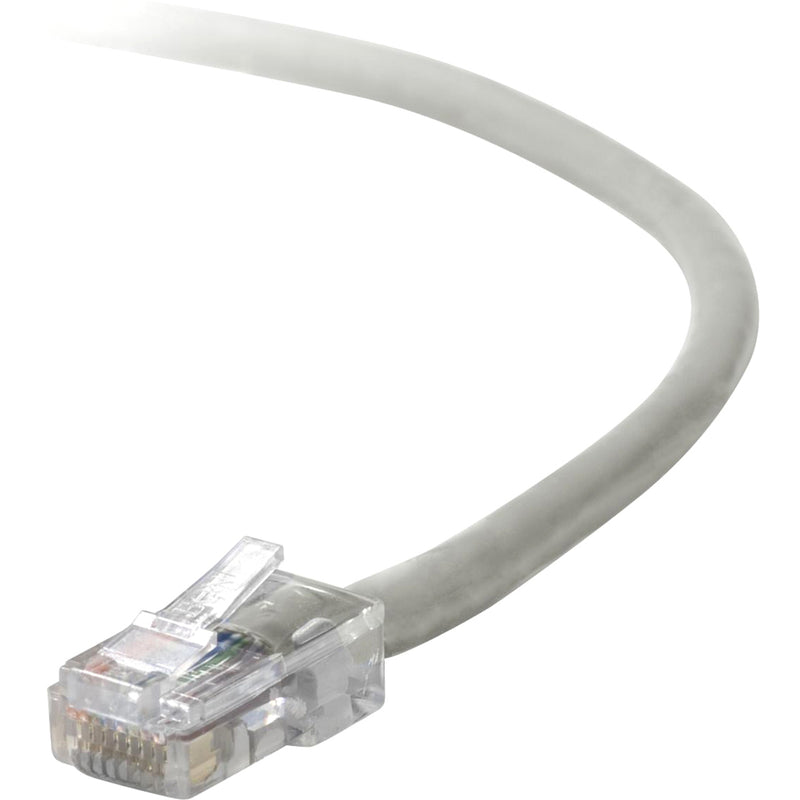 Close-up view of Belkin CAT5e network cable's RJ45 connector with gray cable