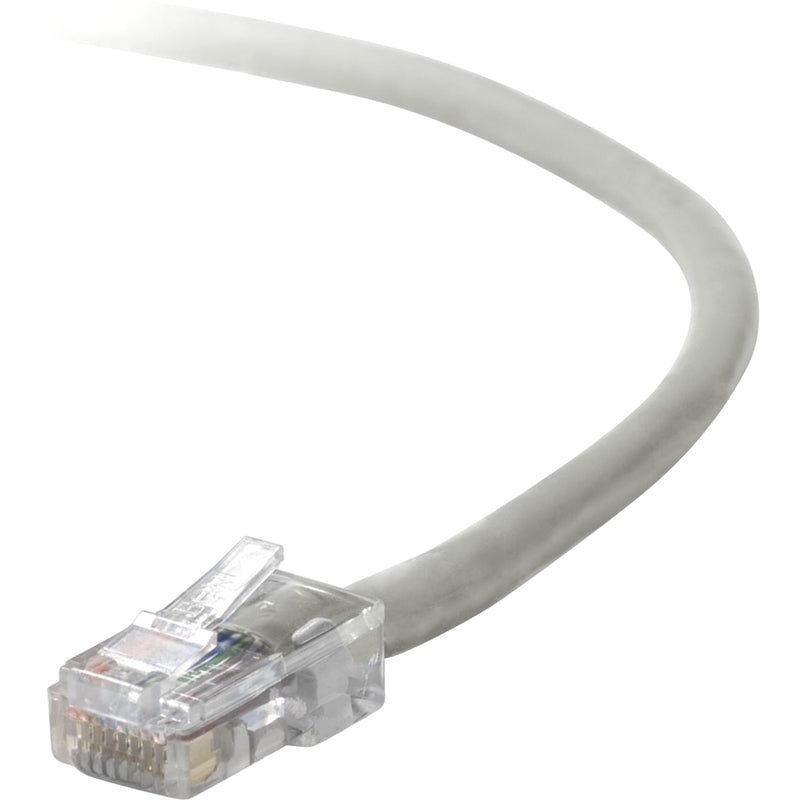 Close-up view of Belkin Cat5e network cable showing transparent RJ45 connector and gray cable jacket