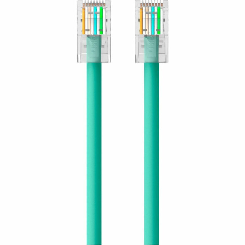 Detailed view of RJ45 connector internal wiring and strain relief of green Cat 6 cable