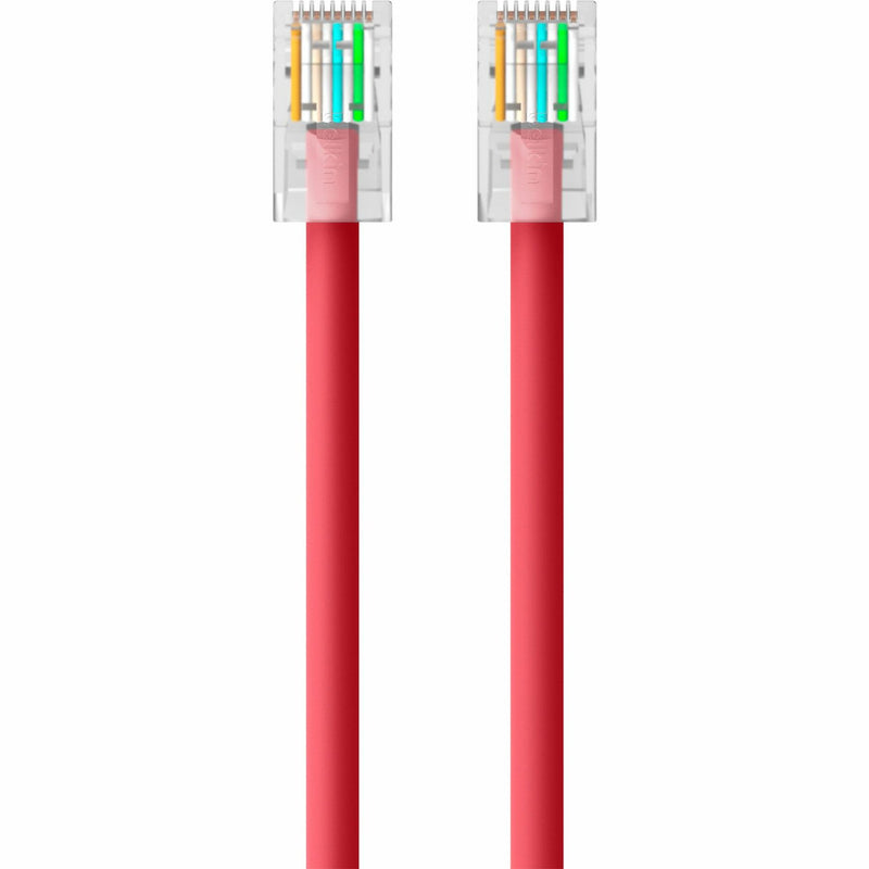 Top view of RJ45 connector showing color-coded internal wiring arrangement on red ethernet cable