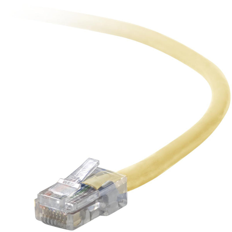 Close-up view of transparent RJ45 connector attached to yellow Cat5e network cable