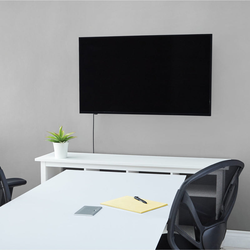 Modern conference room showing installed connectivity box with clean minimal design