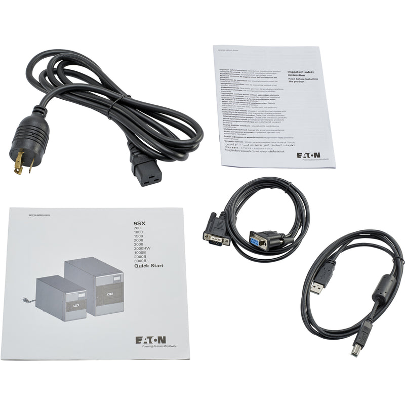 Package contents showing power cord, USB cable, serial cable, and documentation