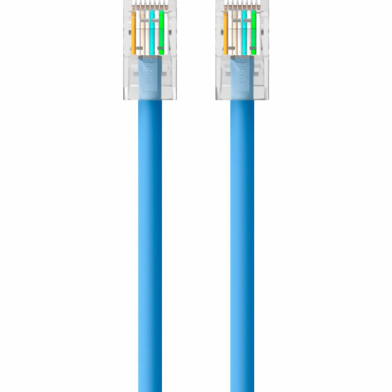 Detailed view of color-coded wire arrangement in RJ45 connector of CAT5e cable