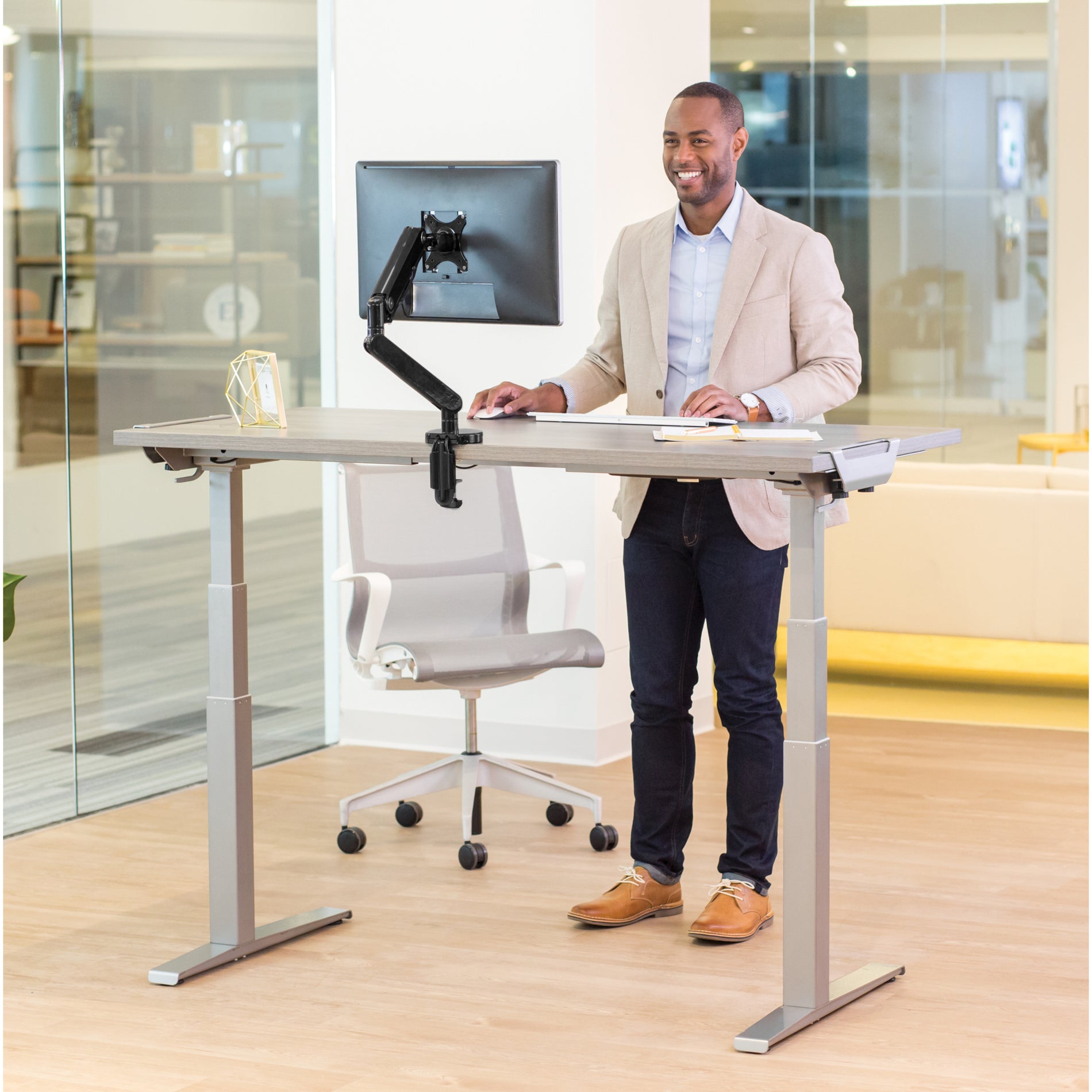 Professional working at Levado desk showing complete workspace setup-alternate-image9