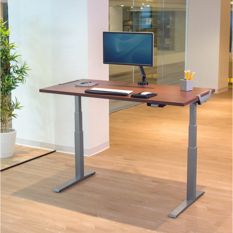 Levado standing desk with ergonomic accessories and monitor mount in modern office setting