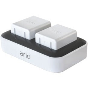 Arlo dual charging station with two white battery slots on black base showing simultaneous charging capability-alternate-image1