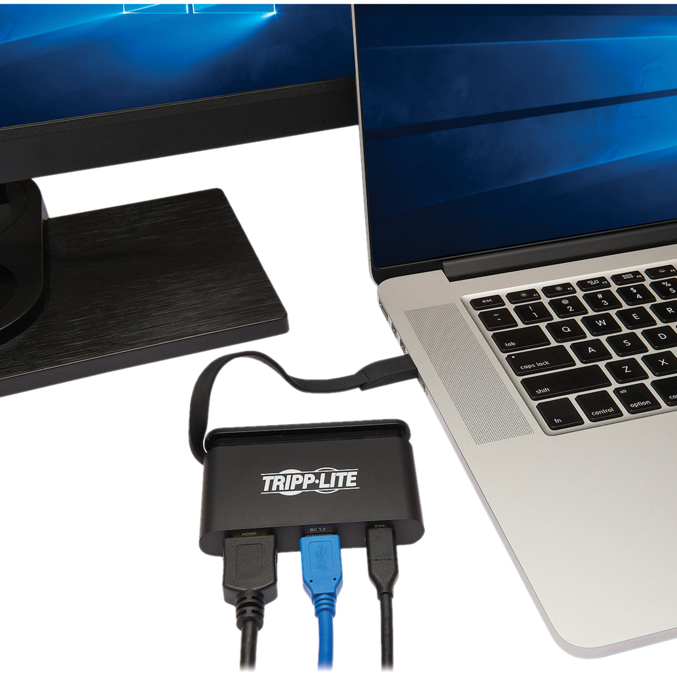 Tripp Lite docking station connected to laptop and monitor in workspace setting-alternate-image9