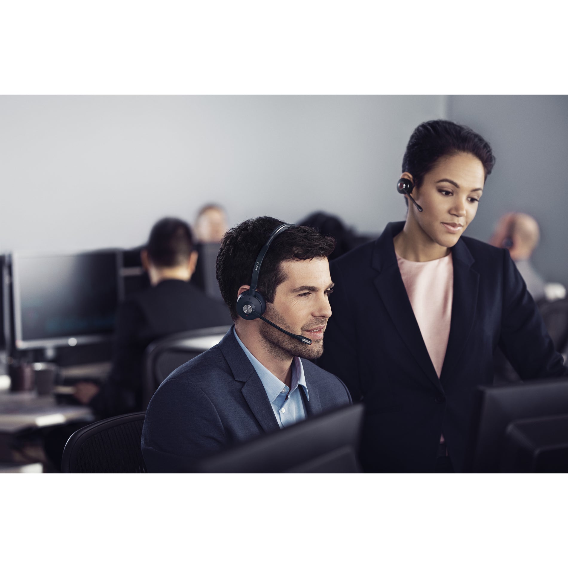 Team members using Jabra Engage 65 headsets in collaborative office setting-alternate-image12