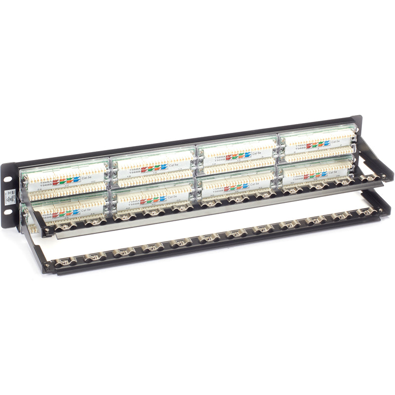 Rear view of patch panel showing IDC terminal blocks and cable management system