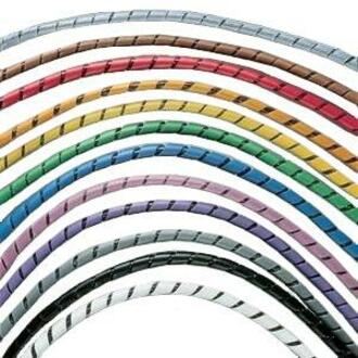 Multiple colored spiral wrap cable management solutions arranged in parallel lines showing various color options including black, blue, green, yellow, red, and white