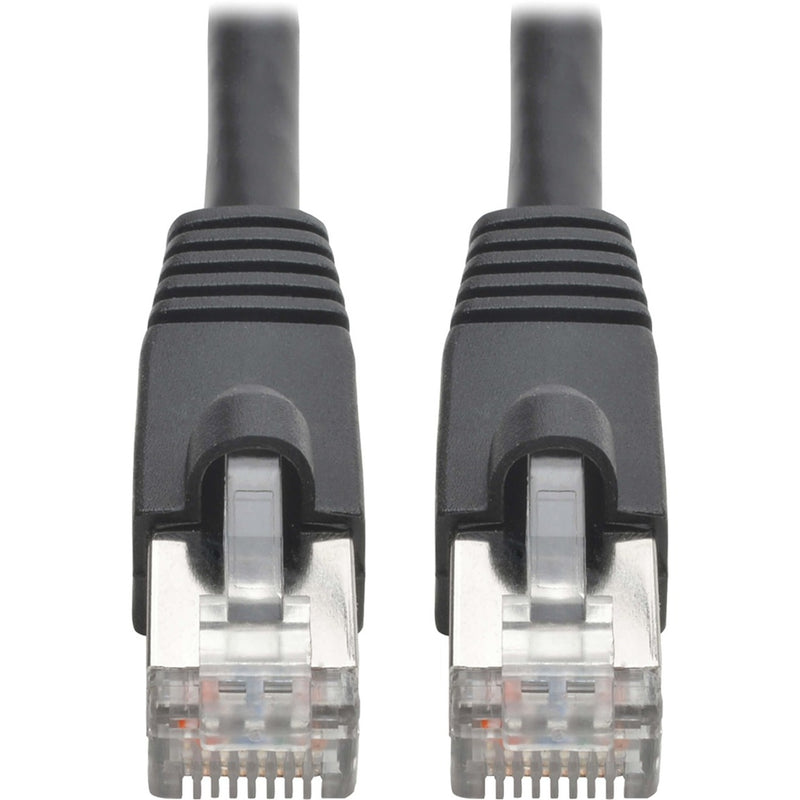 Close-up view of shielded RJ45 connectors with snagless boots on Cat6a network cable