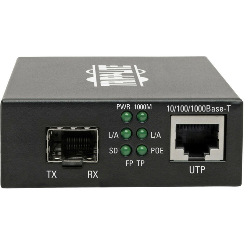 Close-up view of media converter ports and LED status indicators showing TX/RX and UTP connections