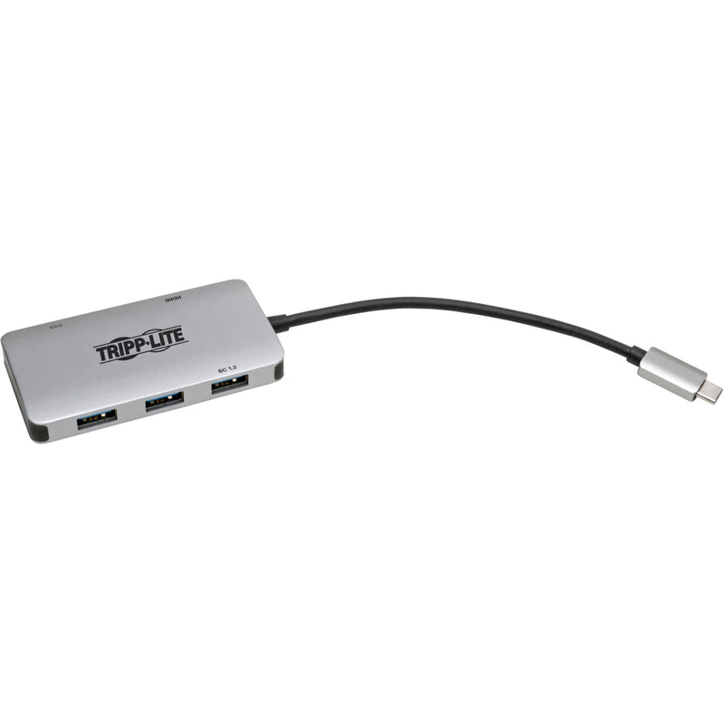 Angled view of Tripp Lite adapter showing slim profile and multiple ports