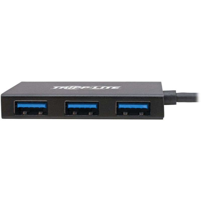 Close-up view of Tripp Lite USB hub's three USB-A ports with blue accents