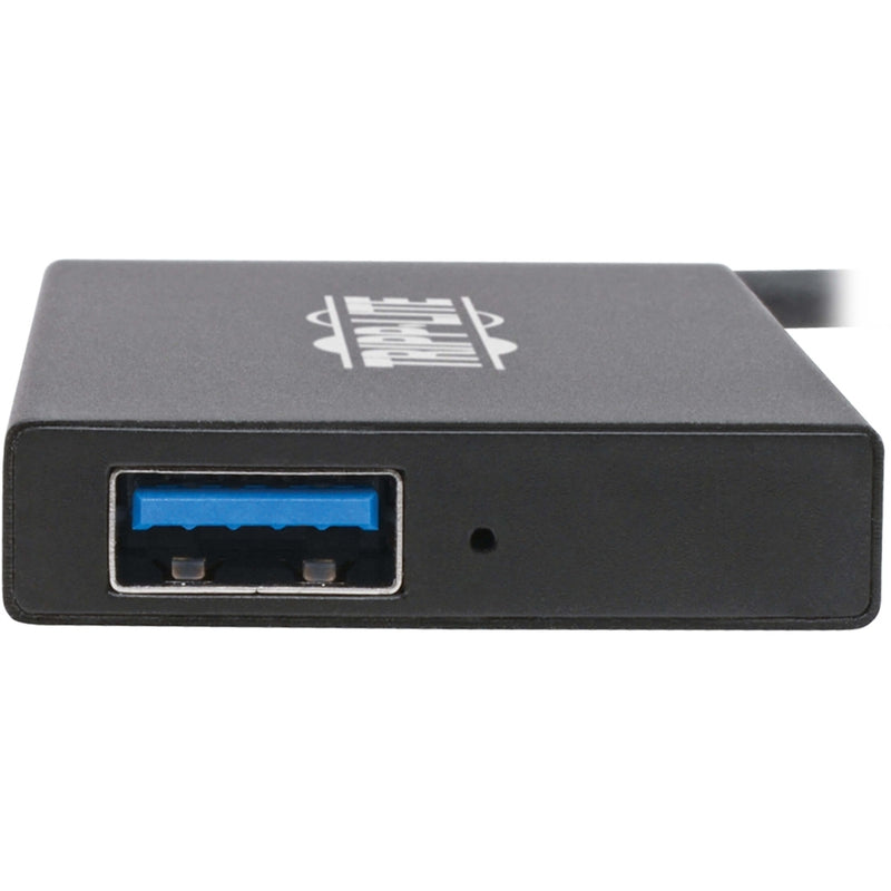 Detailed view of single USB port with blue LED indicator on Tripp Lite hub