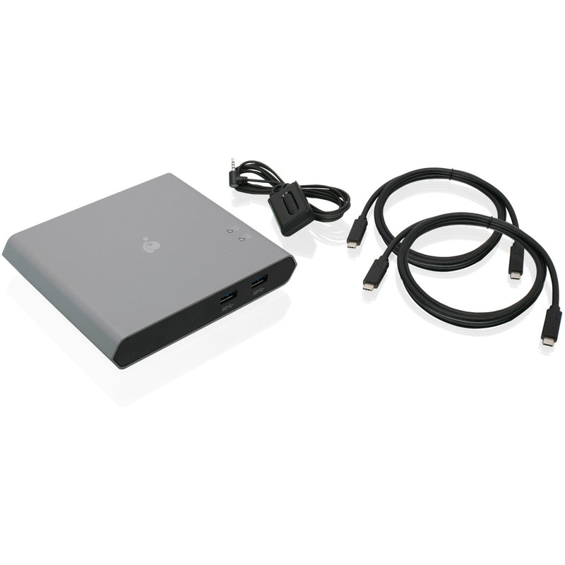 IOGEAR USB-C KVM switch shown with included USB-C cables and remote push-button switch