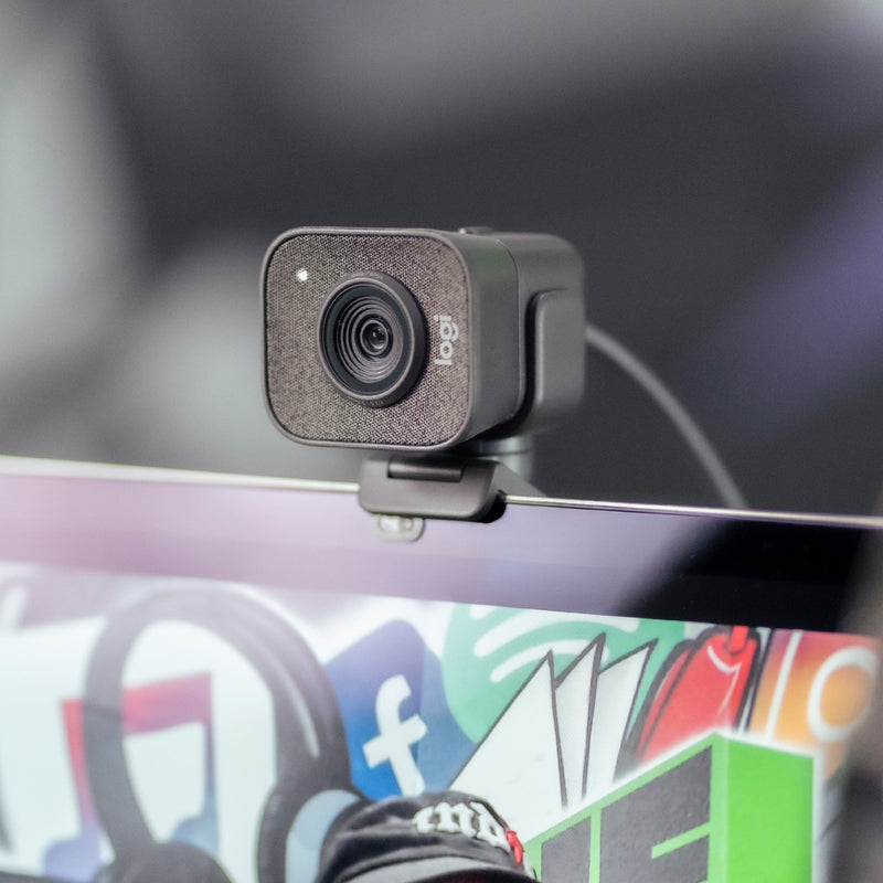 Close-up of StreamCam Plus mounted on monitor edge