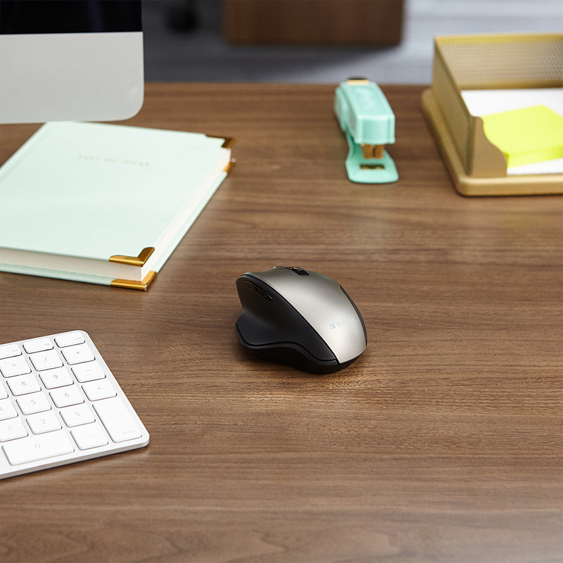 Verbatim Silent Mouse on a wooden desk with office accessories