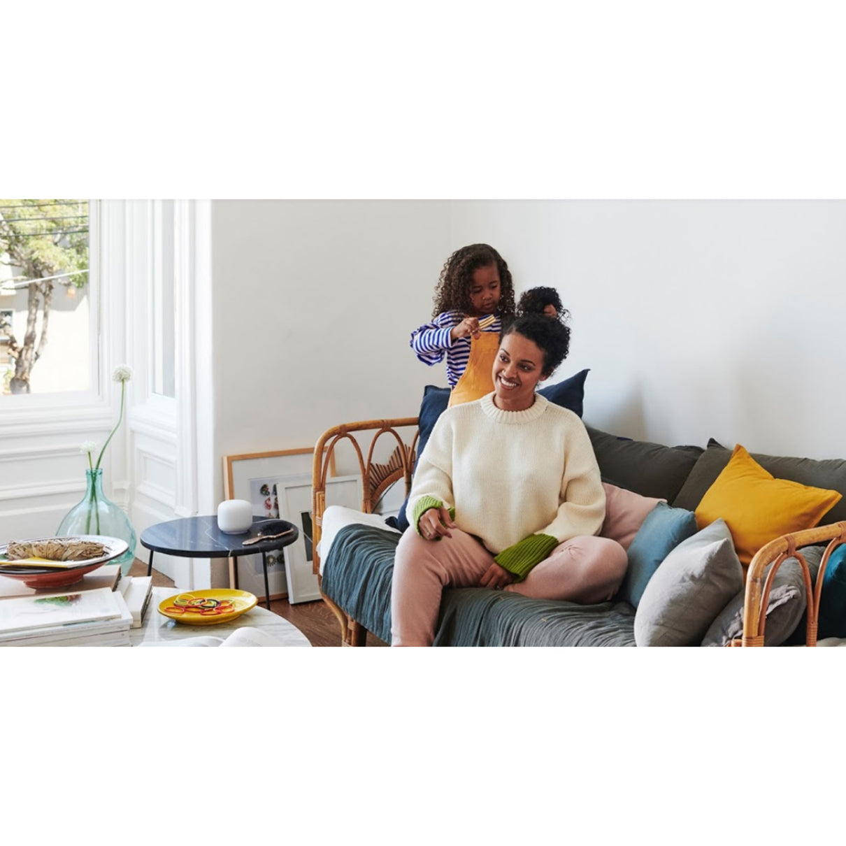 Living room scene with Nest Wifi router and relaxed family atmosphere-alternate-image8