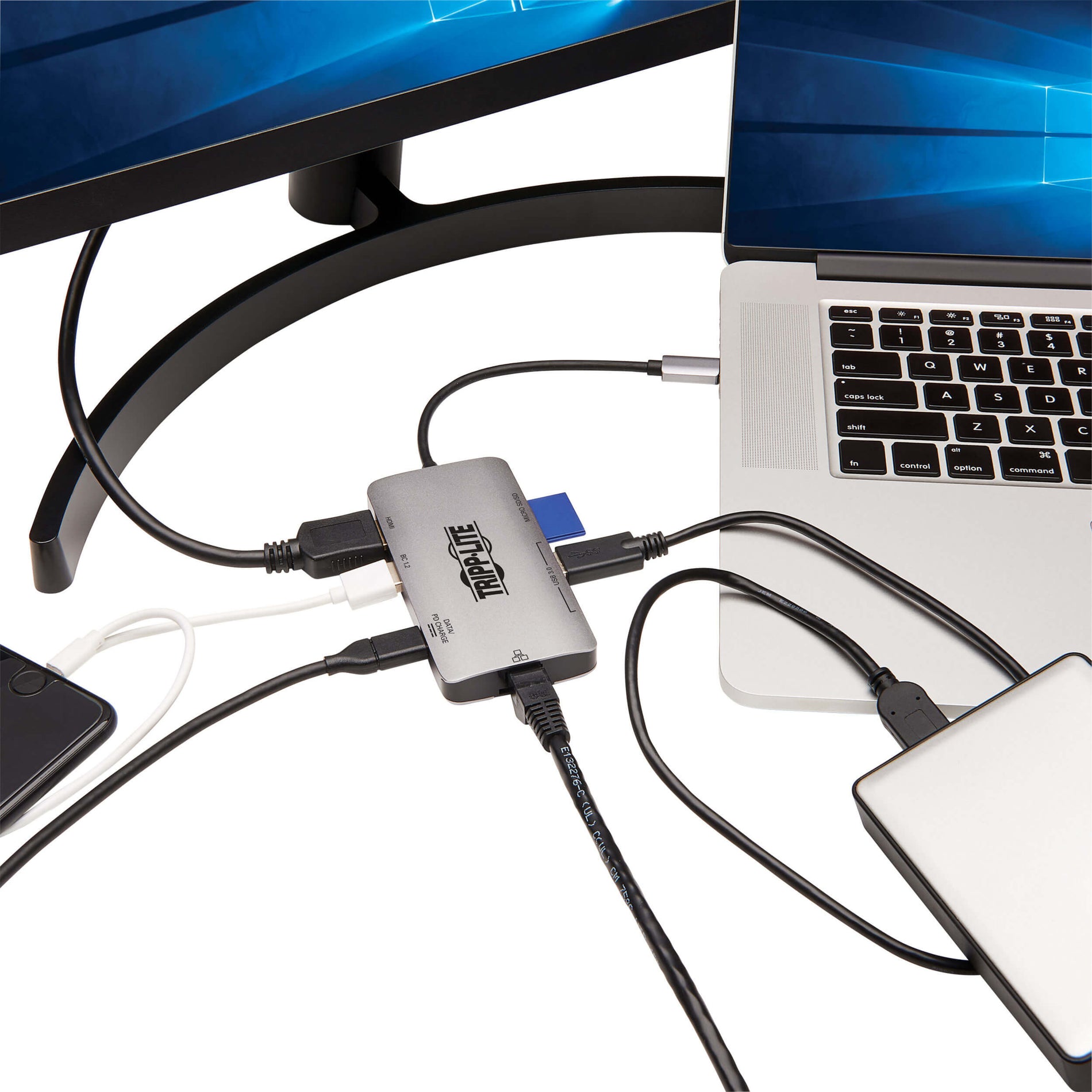 Tripp Lite docking station connected to laptop with multiple peripherals in use-alternate-image5