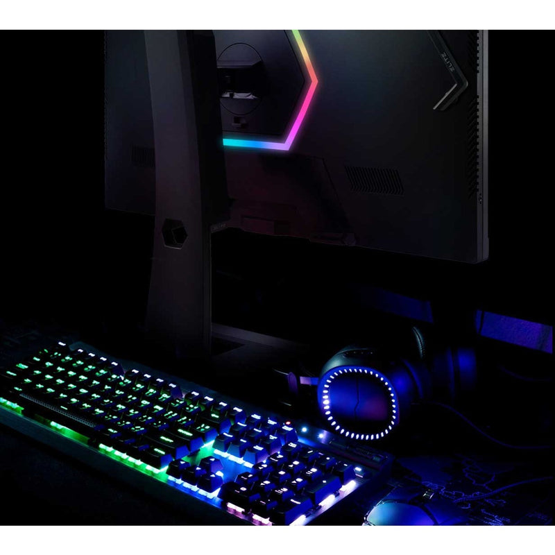 Dark room setup showing monitor's RGB lighting effects