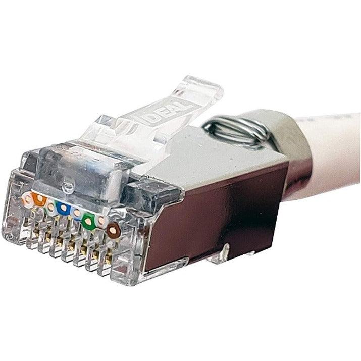 Close-up view of IDEAL Cat6A shielded connector showing gold-plated contact pins and clear housing