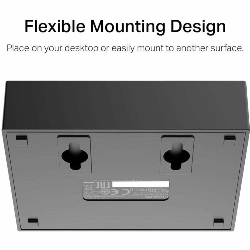 Bottom view of TP-Link LS1005G switch showing mounting options and installation points