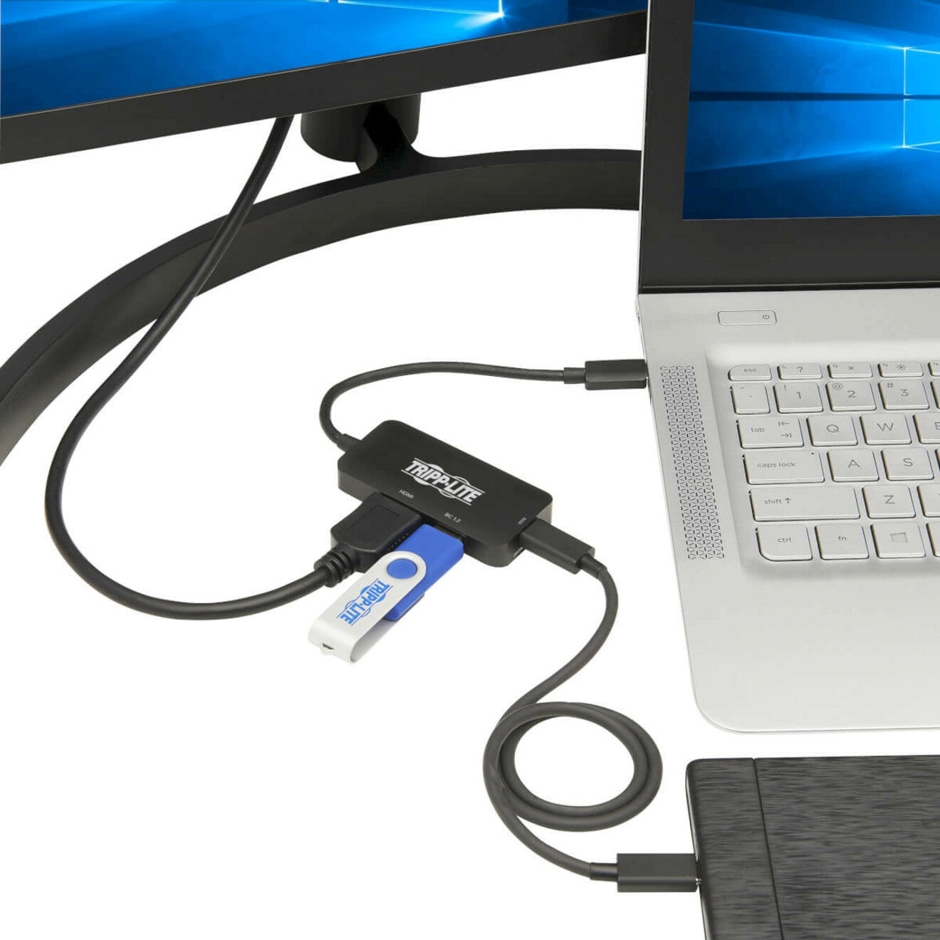 Tripp Lite USB-C adapter connected to laptop with USB drive and display-alternate-image6