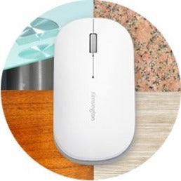 Kensington SureTrack mouse shown on various surfaces including glass, wood, and stone