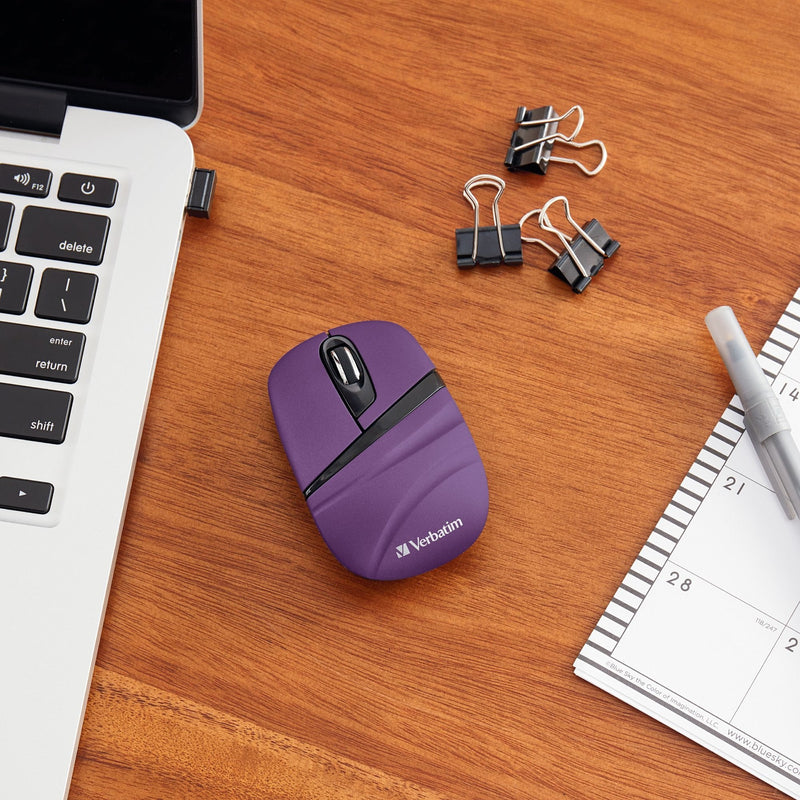 Verbatim wireless mouse shown in office setting with laptop and accessories