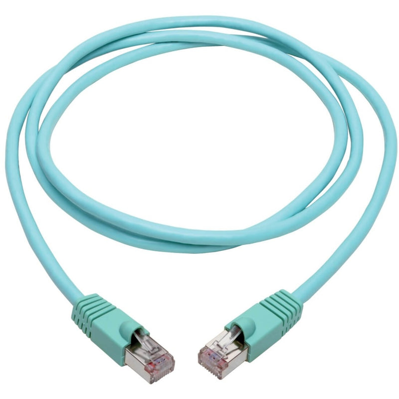 Full length view of coiled aqua Cat6a ethernet patch cable showing flexibility