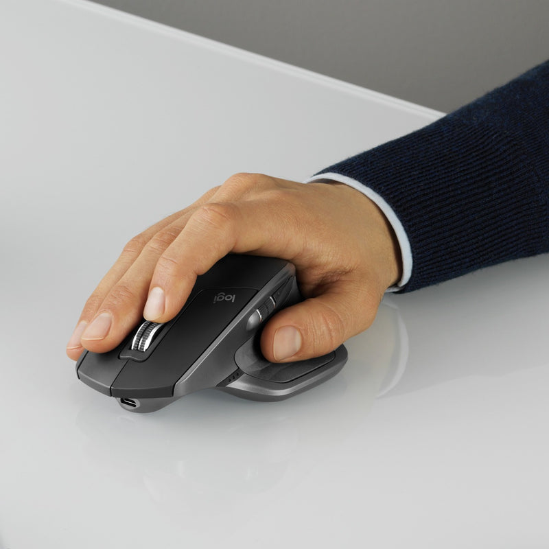 Close-up of hand grip on Logitech MX Master 2S showing natural positioning