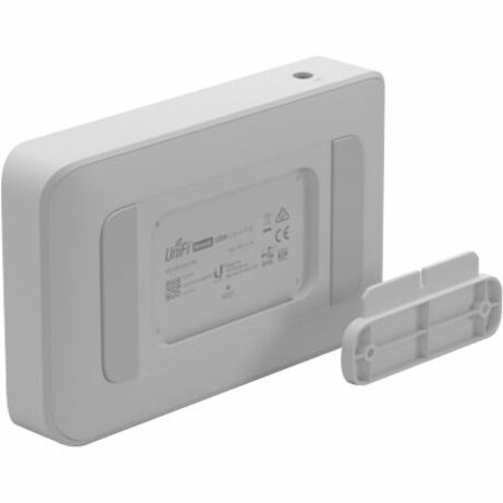 UniFi Switch Lite 8 PoE with mounting bracket and installation components