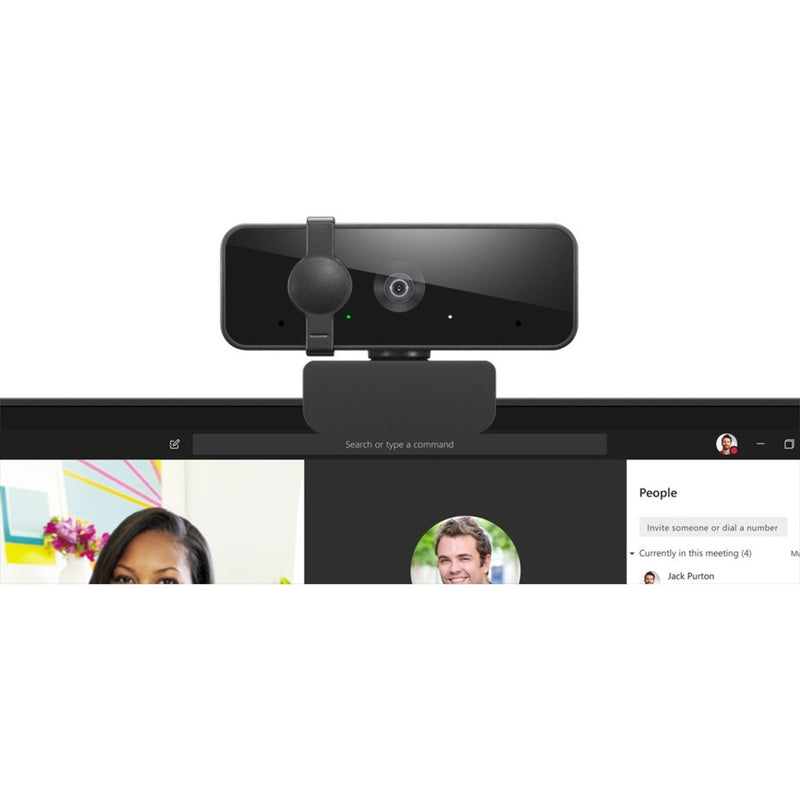 Close-up view of Lenovo Essential FHD Webcam mounted on monitor