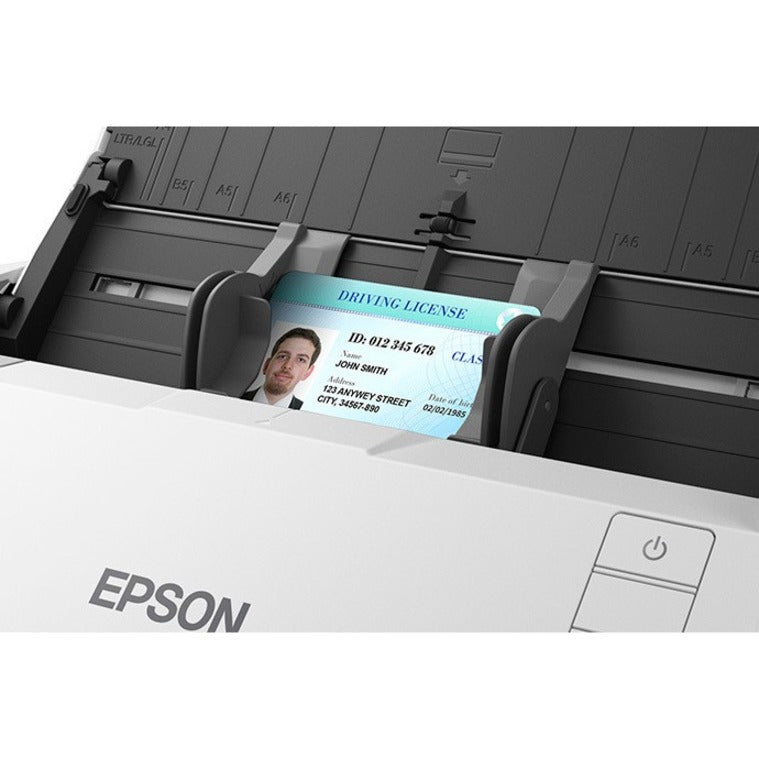 Close-up of ID card being scanned through Epson DS-530 II