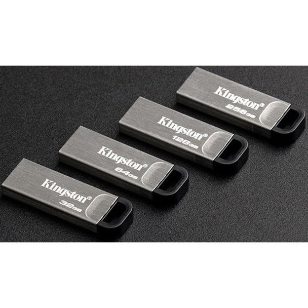 Multiple Kingston DataTraveler Kyson USB drives arranged to show size range