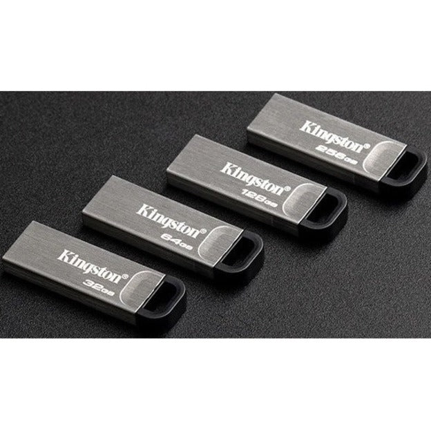 Multiple Kingston DataTraveler Kyson USB drives arranged to show size range