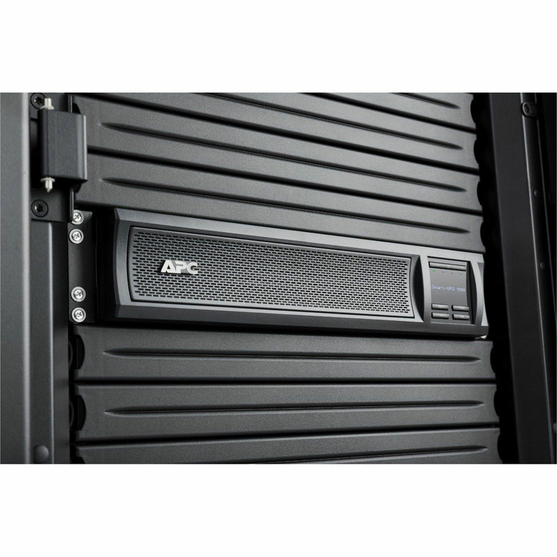 Close-up view of APC Smart-UPS mounted in server rack showing integration details