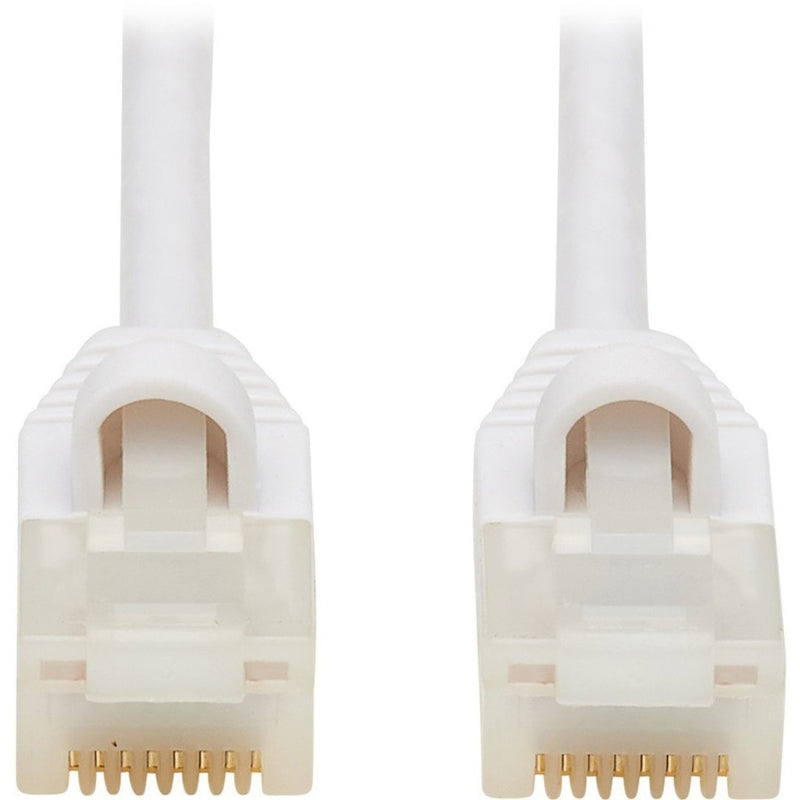 Close-up view of white Cat6a cable RJ45 connectors with gold-plated contacts and snagless design