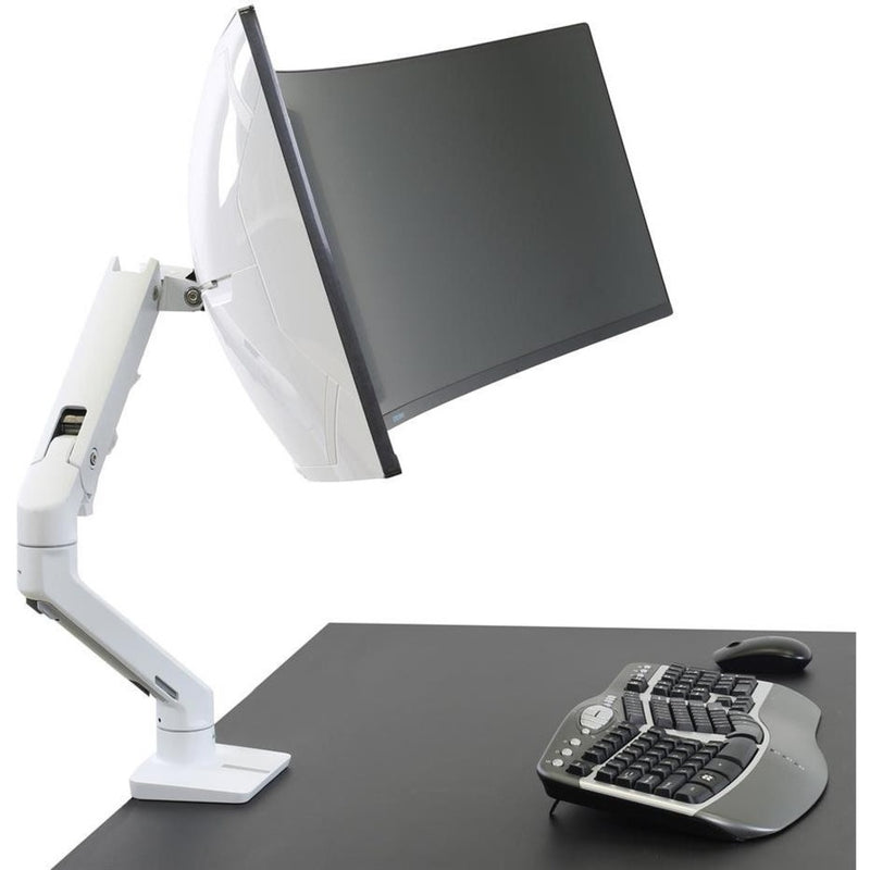 Side view of Ergotron HX monitor arm showing full extension capability with keyboard visible