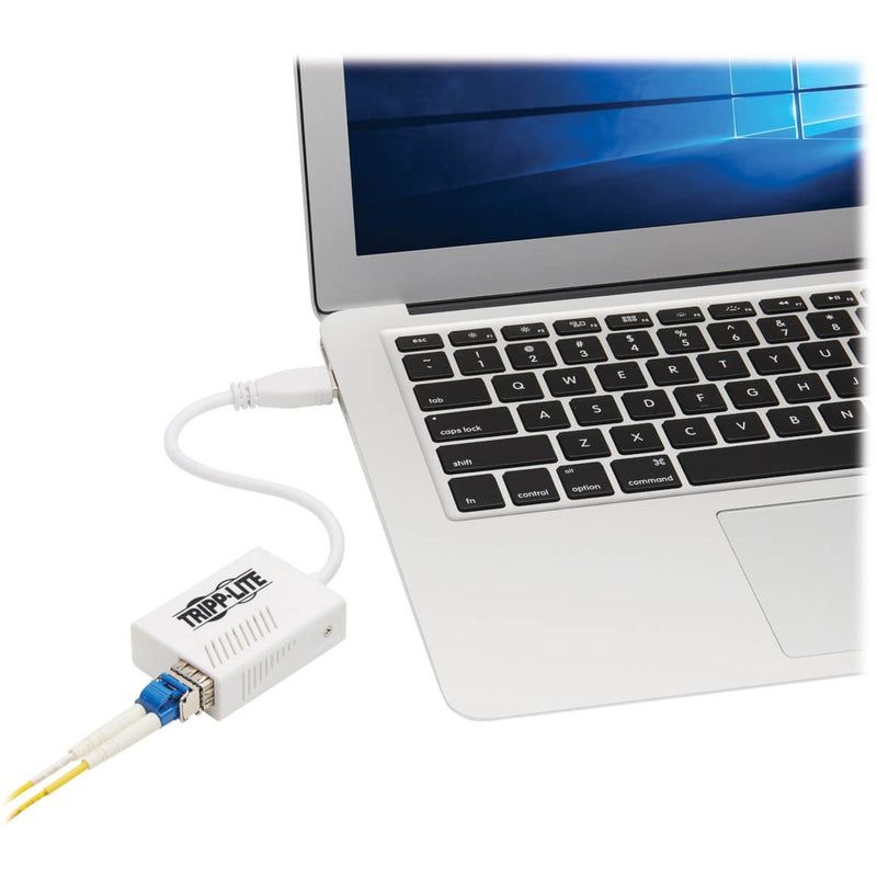 Tripp Lite U336-1G-SFP connected to laptop showing real-world usage scenario