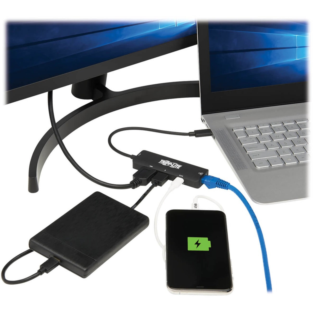 Tripp Lite adapter in use connecting laptop to multiple peripherals including monitor and external drive-alternate-image7