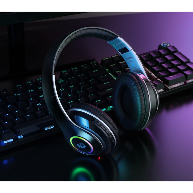 Adesso Xtream P500 headphones with RGB lighting effects next to gaming keyboard