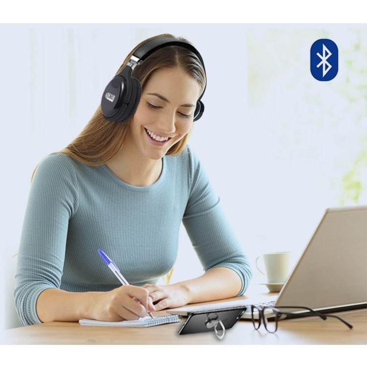 Person wearing Adesso Xtream P600 headphones while working on laptop-alternate-image5