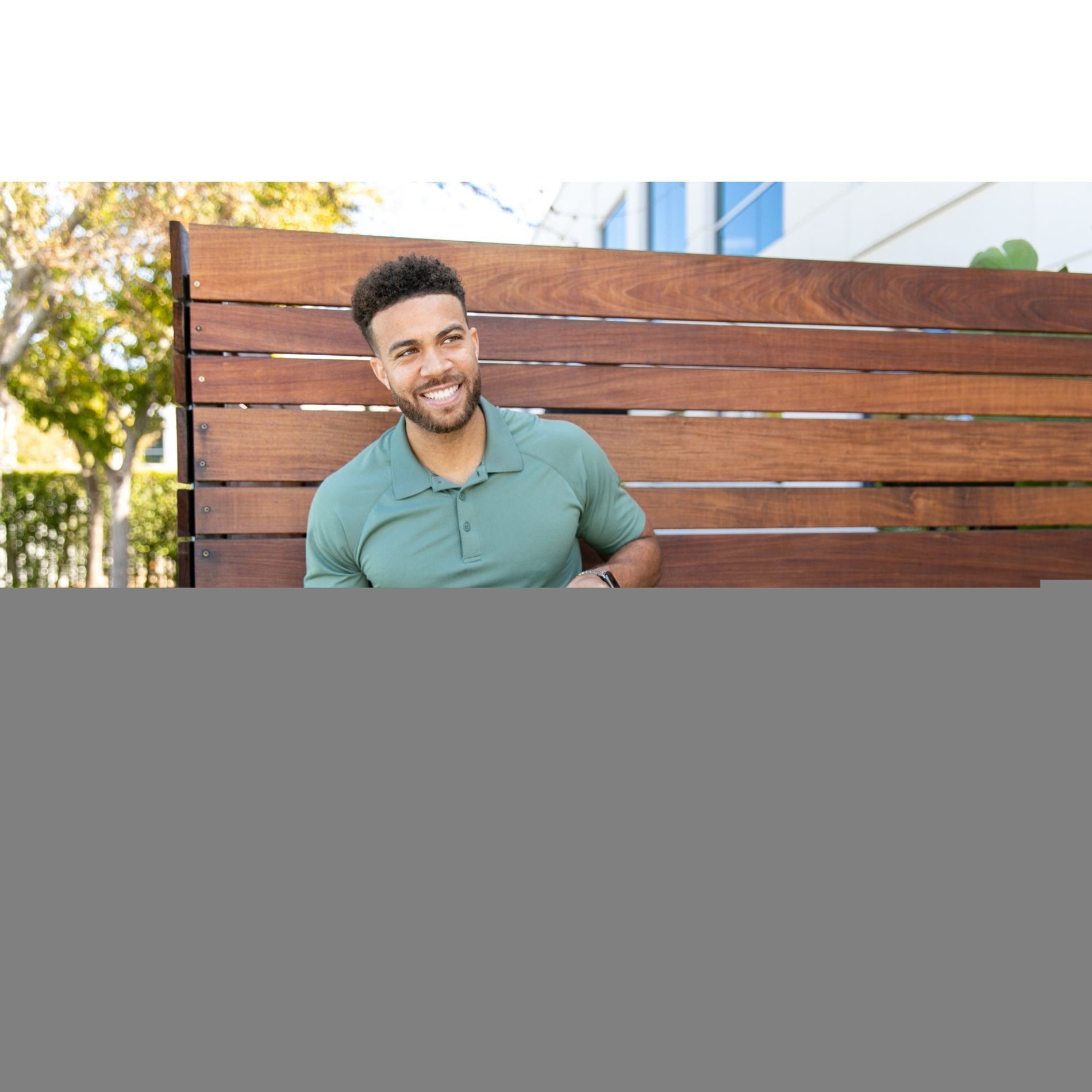 Person working outdoors with laptop protected by CODi Aegis sleeve-alternate-image5