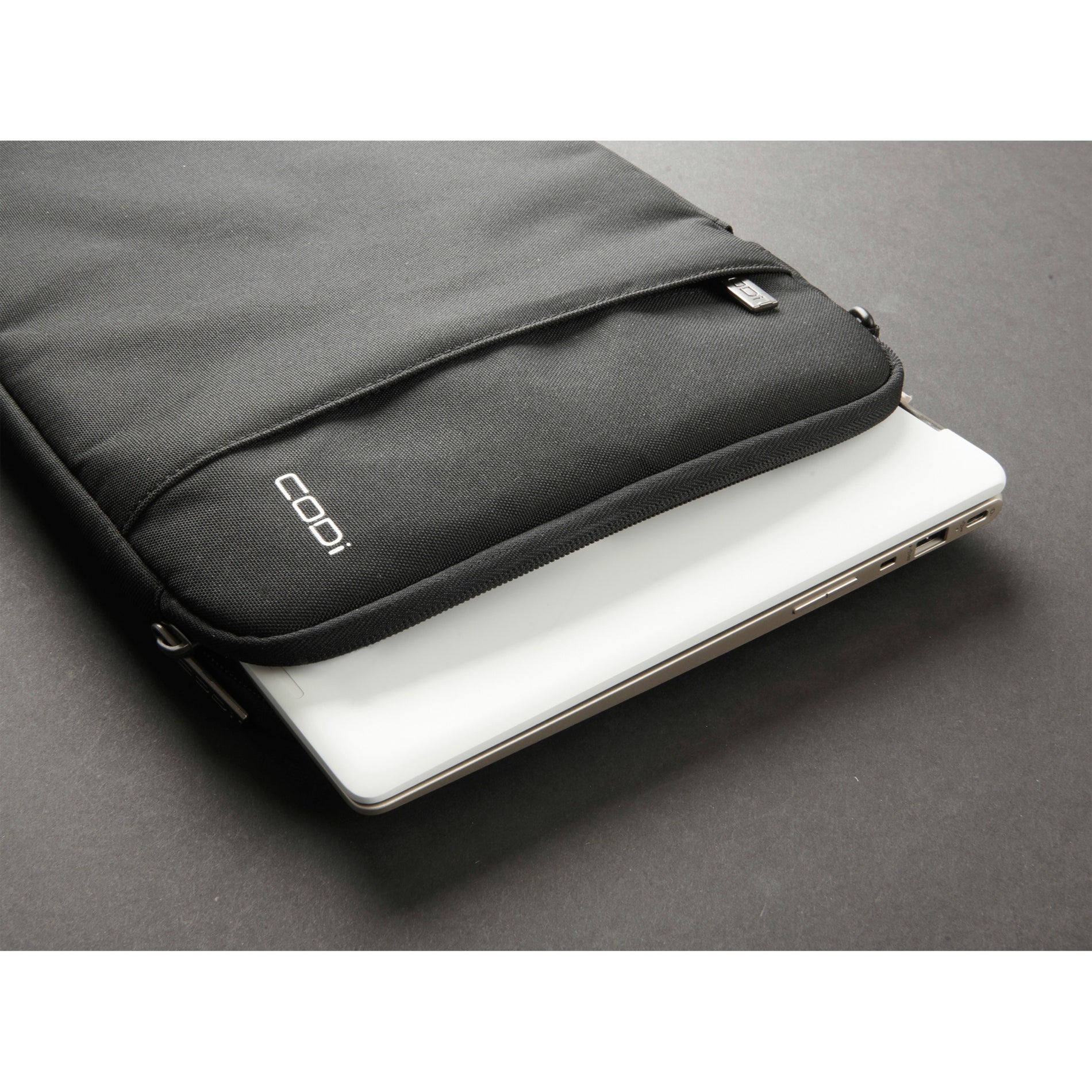 CODi Aegis sleeve shown with laptop partially inserted to demonstrate fit-alternate-image4